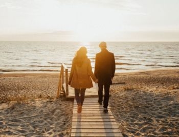 Couple walking on beach