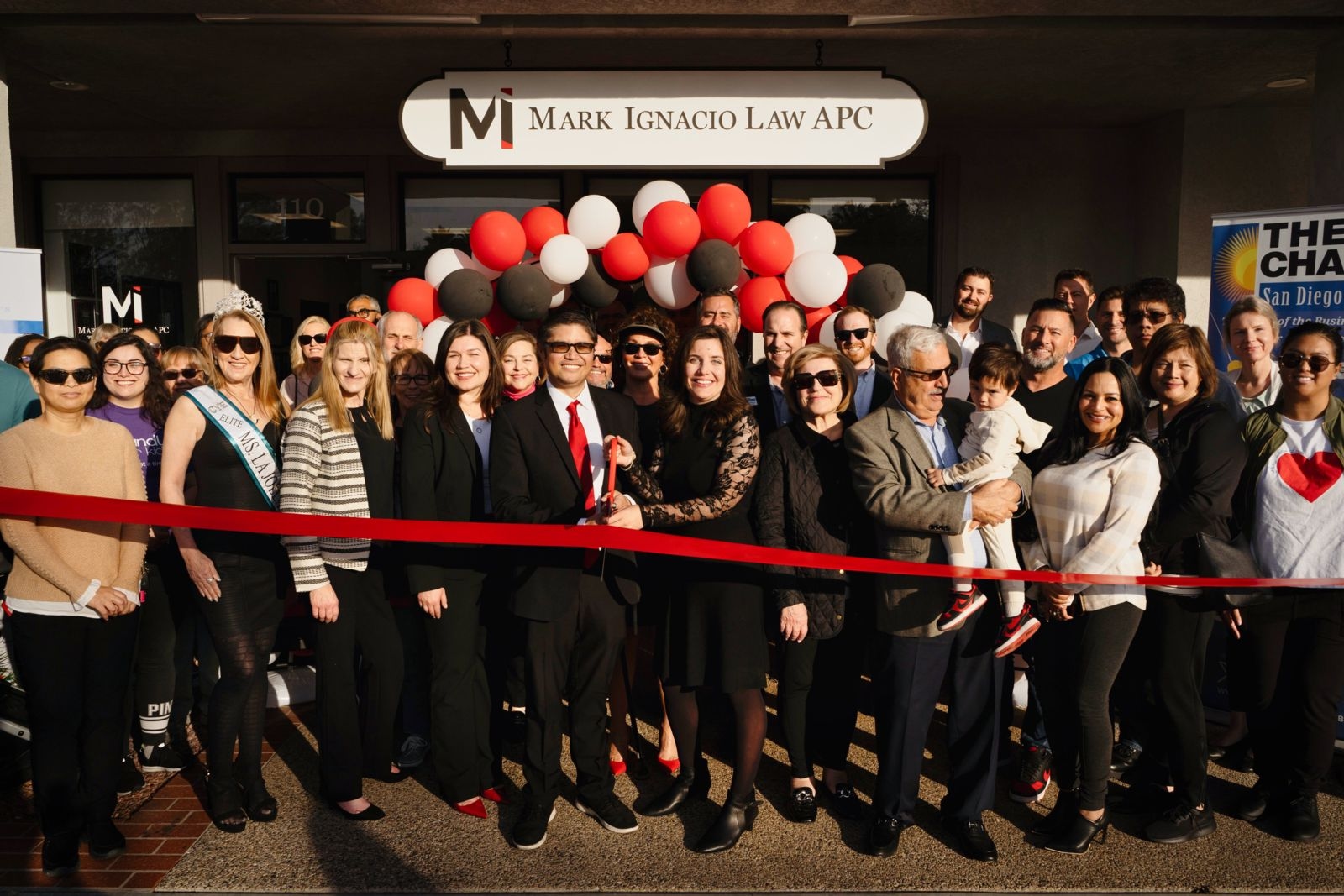 Mark Ignacio and community celebrating at Ribbon-Cutting Ceremony | San Diego estate planning lawyer
