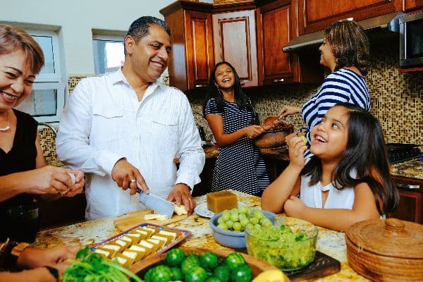 Multi-generational-family-laughing-in-home